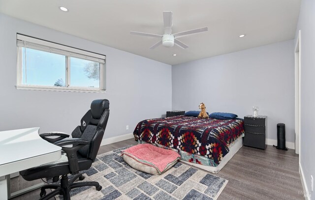 bedroom featuring recessed lighting, a ceiling fan, baseboards, and wood finished floors