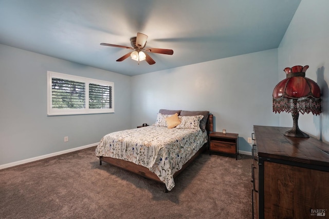 bedroom with a ceiling fan, baseboards, and dark colored carpet