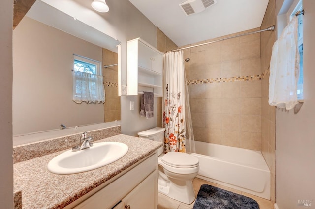 bathroom featuring visible vents, toilet, shower / tub combo with curtain, tile patterned flooring, and vanity