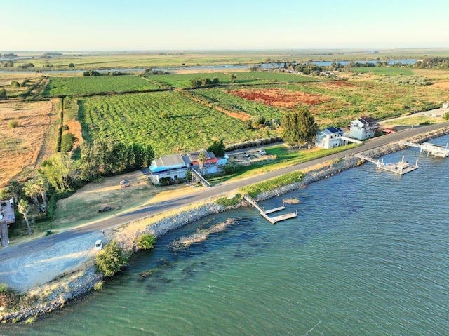 bird's eye view featuring a rural view and a water view