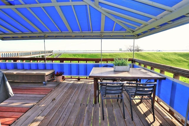 wooden deck with outdoor dining area