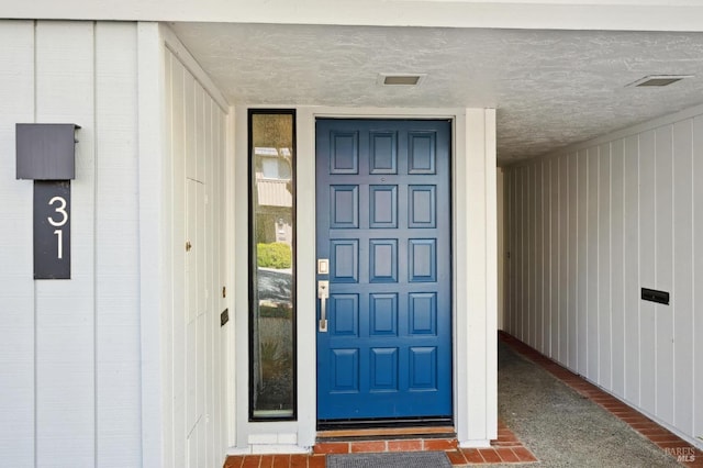 entrance to property with visible vents