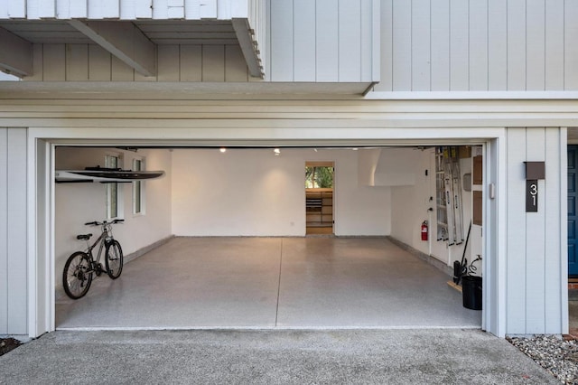 garage featuring driveway