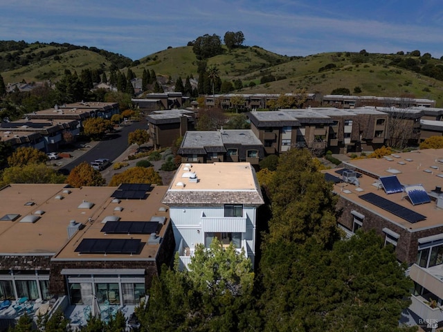 drone / aerial view with a mountain view and a residential view