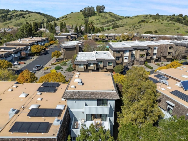 birds eye view of property featuring a mountain view and a residential view