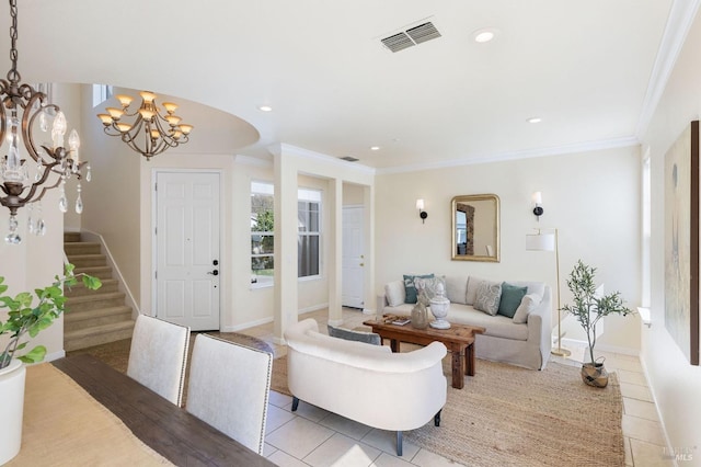 living room with light tile patterned floors, visible vents, recessed lighting, ornamental molding, and a chandelier