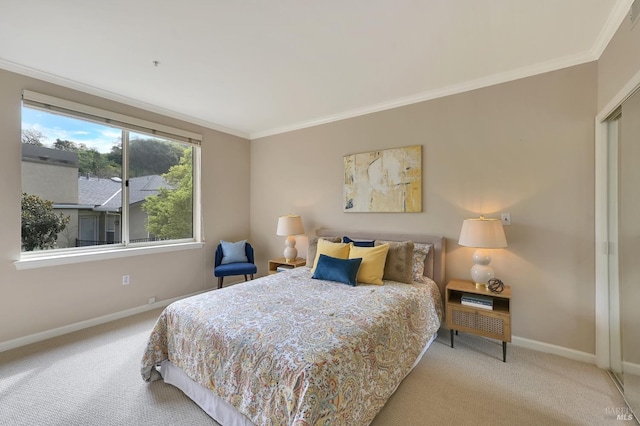 carpeted bedroom featuring baseboards and crown molding