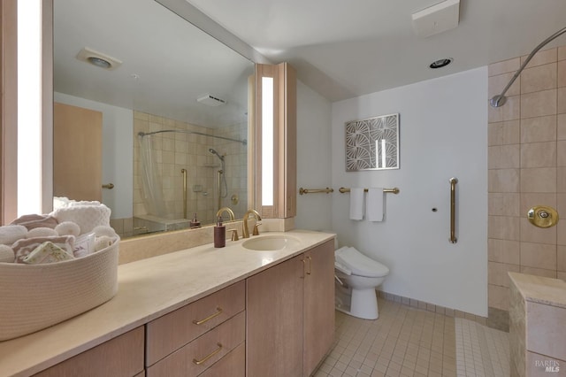 full bathroom with tile patterned flooring, toilet, vanity, and tiled shower