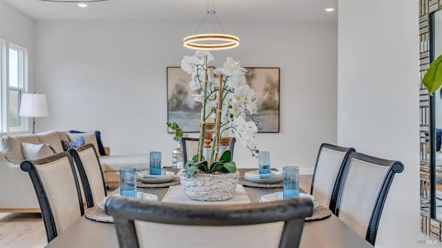 dining space featuring recessed lighting