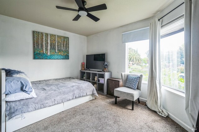 bedroom featuring carpet floors and ceiling fan