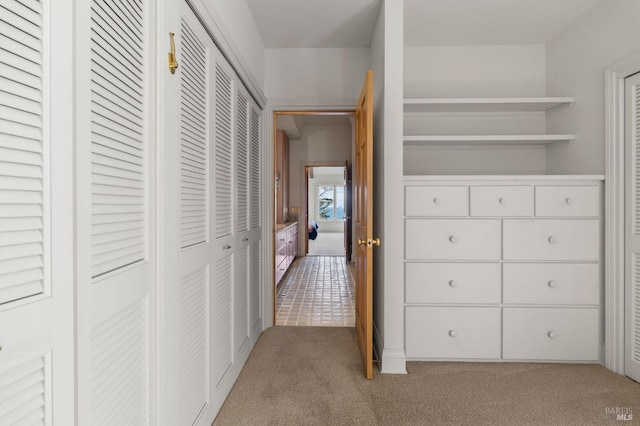 hall with carpet flooring