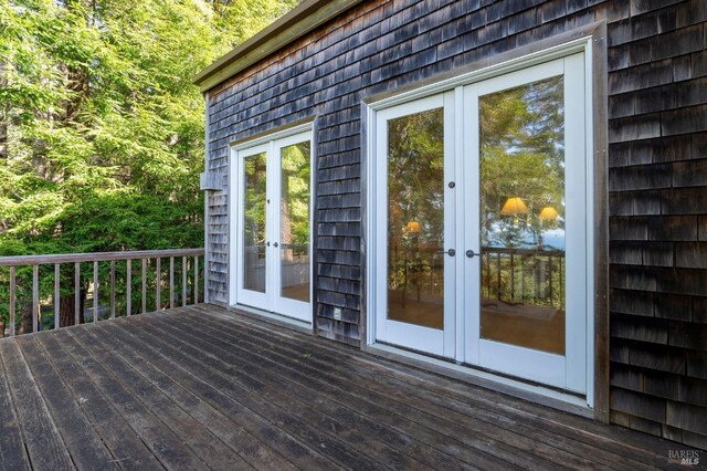 wooden deck featuring french doors