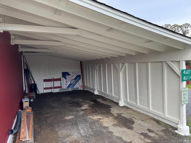 garage featuring a carport