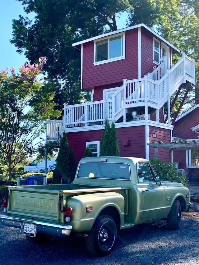 view of front of home with a wooden deck