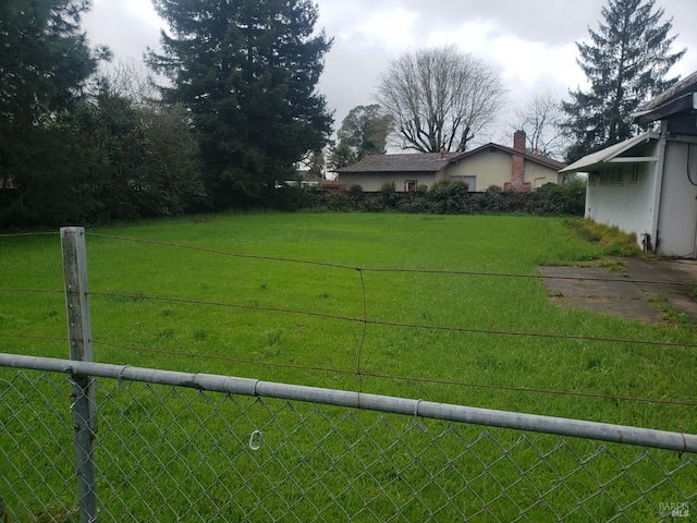 view of yard featuring fence