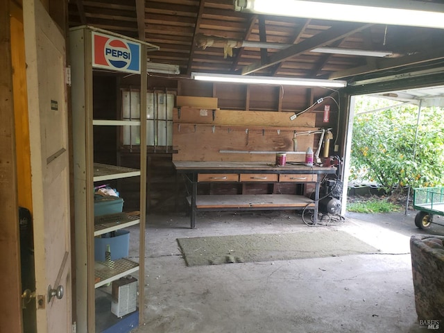 garage featuring a workshop area