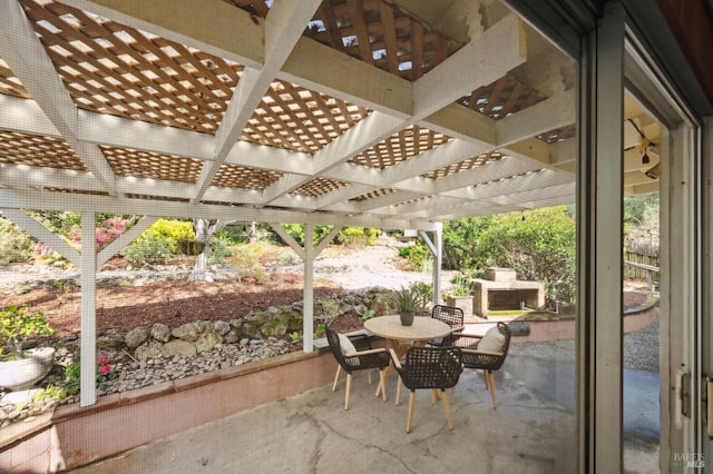 view of patio / terrace with outdoor dining space and a pergola