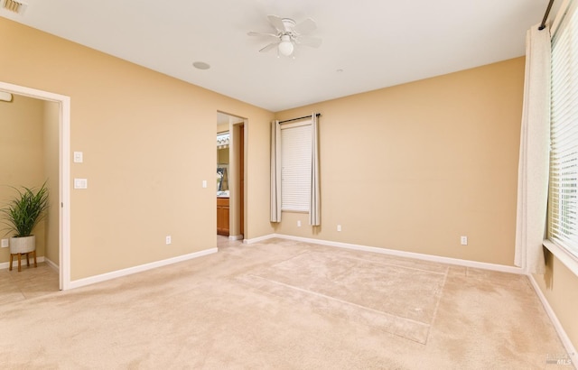 503 Twin Lakes Ln, Rio Vista, CA 94571 - empty room featuring light colored carpet, baseboards, a ceiling fan, and visible vents