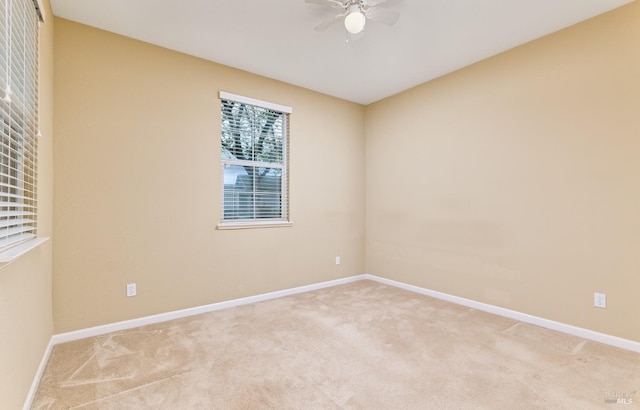 503 Twin Lakes Ln, Rio Vista, CA 94571 - spare room featuring light carpet, baseboards, and ceiling fan