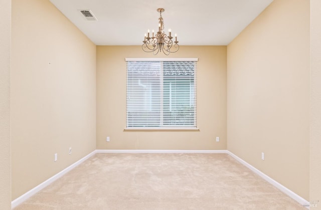 503 Twin Lakes Ln, Rio Vista, CA 94571 - empty room featuring light colored carpet, baseboards, a notable chandelier, and visible vents
