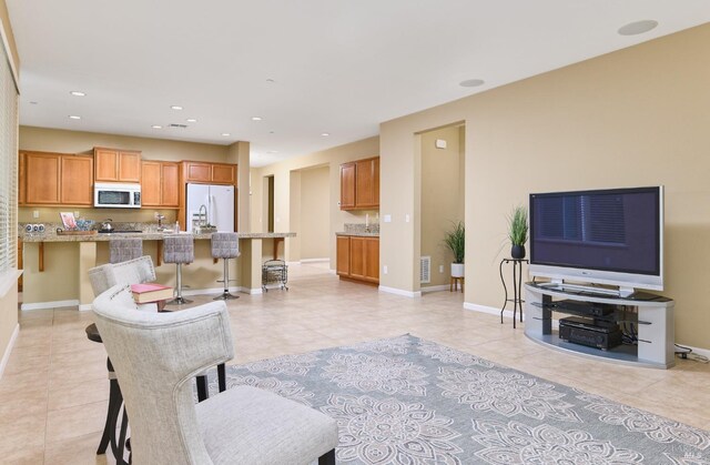 503 Twin Lakes Ln, Rio Vista, CA 94571 - living area with recessed lighting, baseboards, and light tile patterned floors