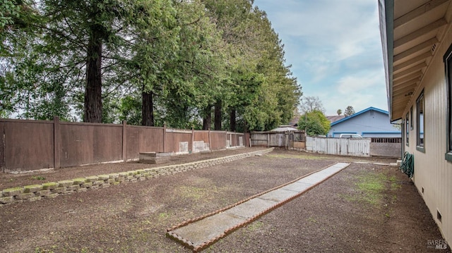 view of yard featuring a fenced backyard