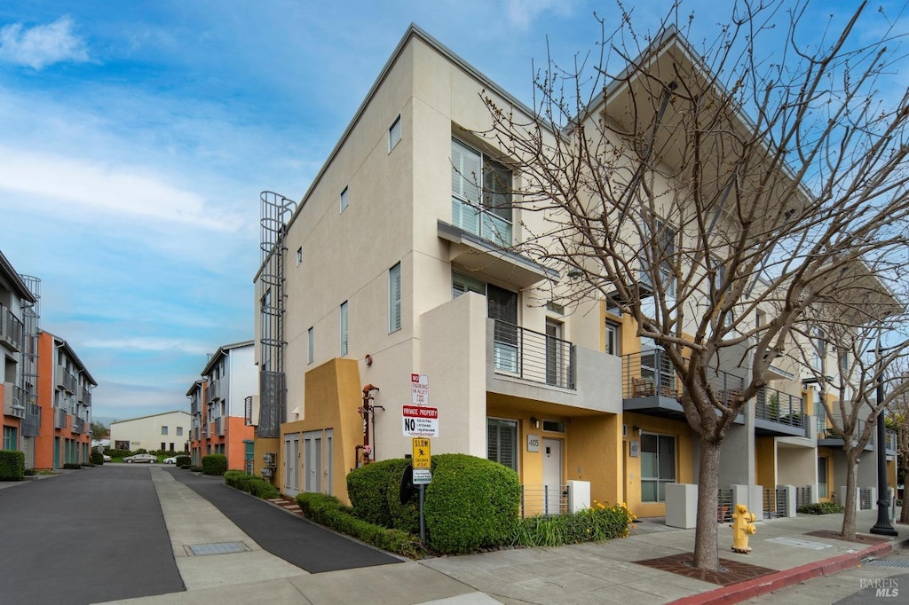 view of property with a residential view