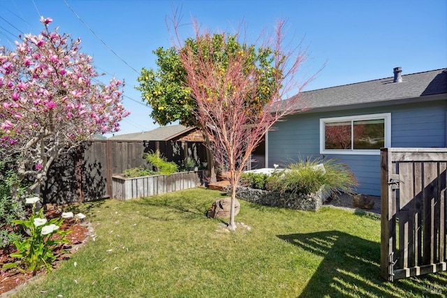 view of yard featuring fence