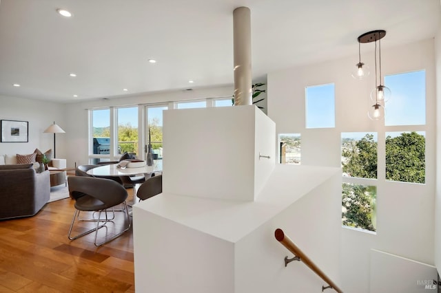 living area featuring recessed lighting and light wood-style floors