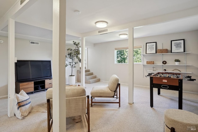 interior space with visible vents, stairs, and baseboards