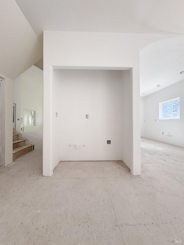 interior space featuring stairs and lofted ceiling