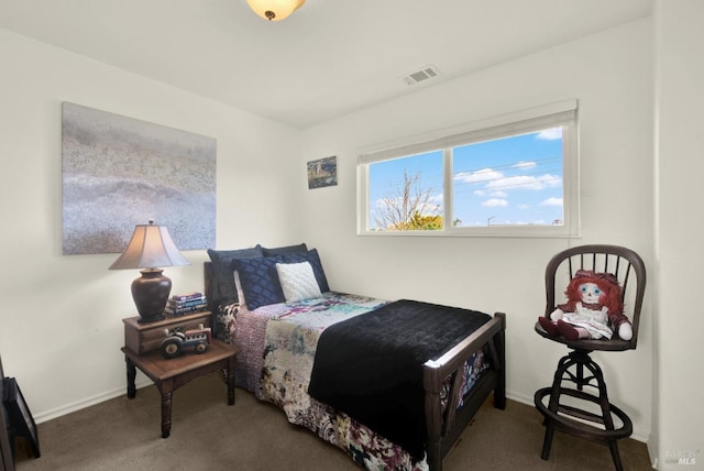bedroom with visible vents, baseboards, and carpet flooring
