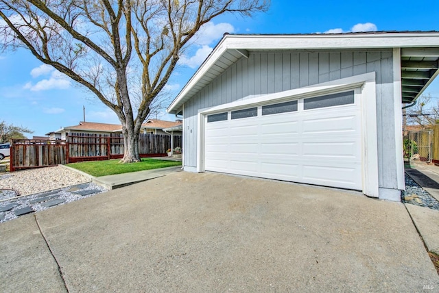 garage featuring fence