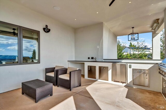view of patio / terrace with a sink and area for grilling