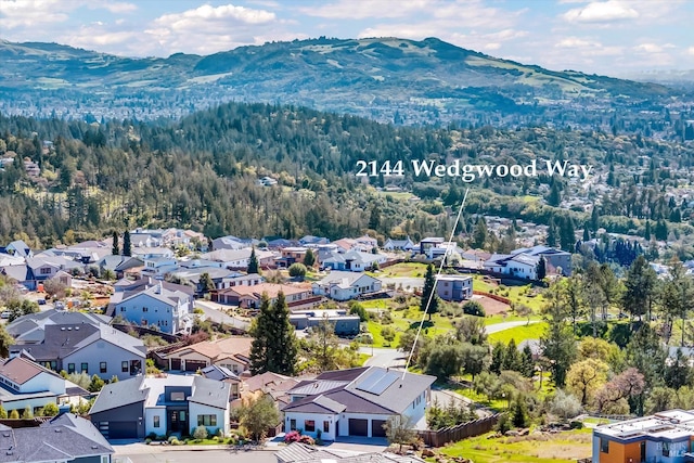 bird's eye view featuring a mountain view and a residential view