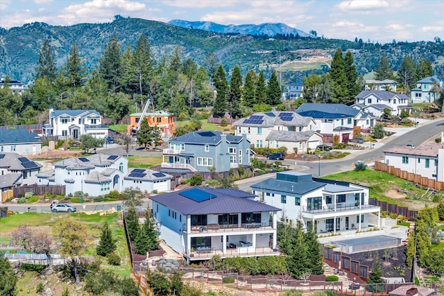 aerial view featuring a mountain view and a residential view
