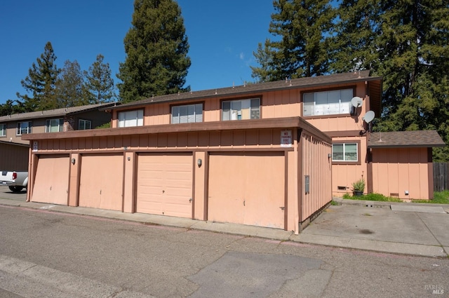 view of front of house featuring community garages and board and batten siding