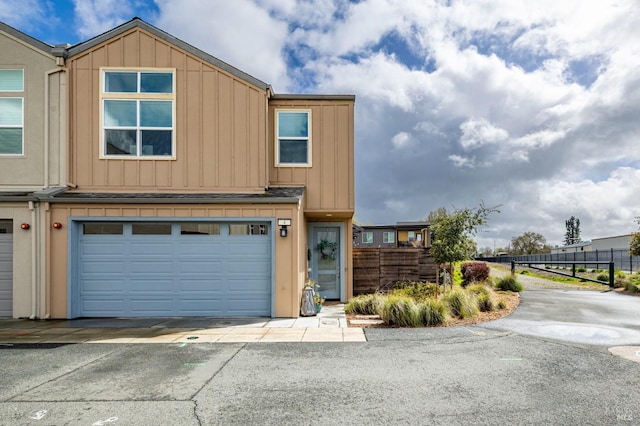 4 Birch Haven Way, Santa Rosa, CA 95407 - townhome / multi-family property with an attached garage, fence, board and batten siding, and driveway