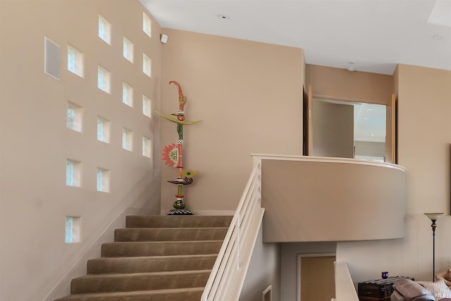stairway with a high ceiling