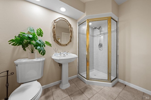 full bathroom featuring tile patterned floors, toilet, baseboards, recessed lighting, and a shower stall