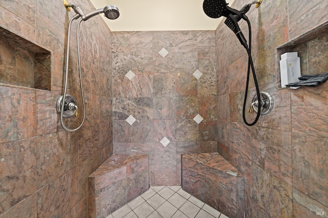 full bath with a tile shower