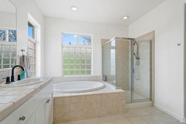 full bath featuring vanity, recessed lighting, a stall shower, tile patterned floors, and a bath