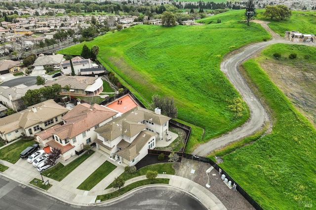 birds eye view of property with a residential view
