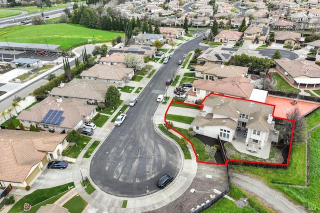 birds eye view of property with a residential view