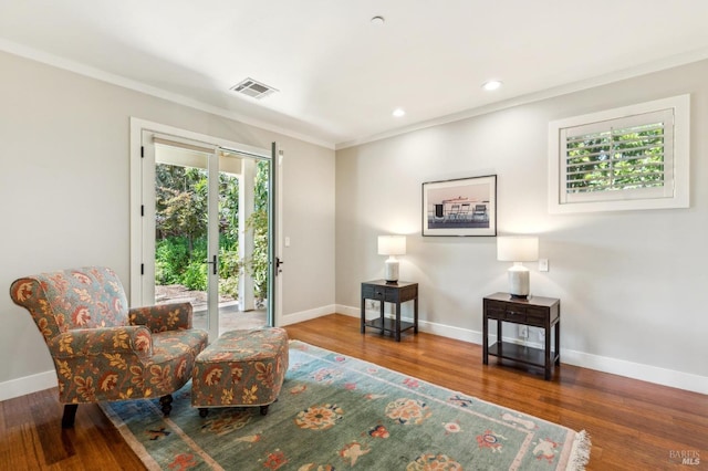 22 S Crane Ave, Saint Helena, CA 94574 - living area with baseboards, wood finished floors, visible vents, and ornamental molding