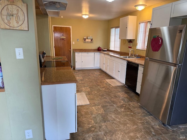 2024 San Luis St, Fairfield, CA 94533 - kitchen featuring freestanding refrigerator, black dishwasher, a sink, and white cabinetry