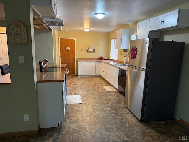 2024 San Luis St, Fairfield, CA 94533 - kitchen with appliances with stainless steel finishes, under cabinet range hood, a sink, white cabinetry, and dark countertops