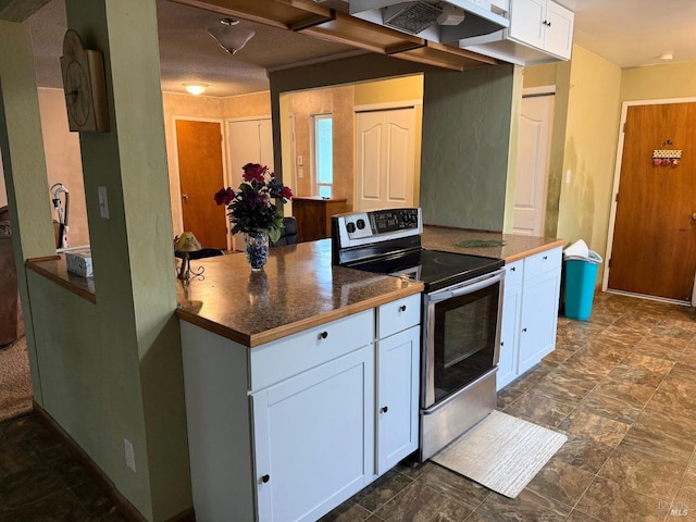 2024 San Luis St, Fairfield, CA 94533 - kitchen featuring stainless steel electric range, white cabinets, and dark countertops