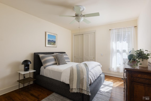 1706 Garnett Creek Ct, Calistoga, CA 94515 - bedroom featuring a closet, baseboards, wood finished floors, and a ceiling fan