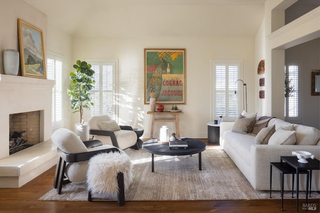 1706 Garnett Creek Ct, Calistoga, CA 94515 - living room featuring a fireplace with raised hearth, wood finished floors, and lofted ceiling